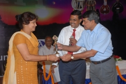 Miss M.K Mishra getting the best Placement Award from Sanjay choudhary.