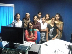 Students enjoying and gaining experience in radio recording.