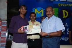 Saurav Prakash recieving the second prize Digital camera from our chief guest MR. N.Thakur in 