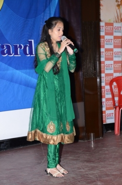 Astha of MBA 4th sem HR singing Jiya Jale song at Academic Excellence Award Function