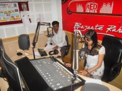 RJ Anshu with PRAYAS Finalist Mahesh, MBA-3rd Sem doing live performence at RED FM Studio 