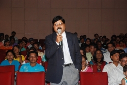 Winner of Genius Lifetime Achievement Award MR.K.D Patil addressing audience.
