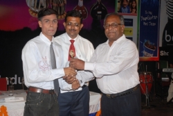 Sourav Jha getting the Award from our chief guest for securing first position in BSCIT.