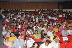 The audiences patiently hearing the speech made by vijay batra