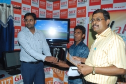 MR. Prashant Kumar giving away the prize to Anish in Daksh 2012. 
