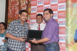 The student recieving the first prize from our chief guest.