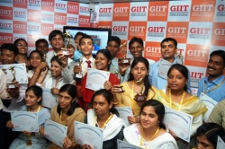 Students with certificates after workshop.